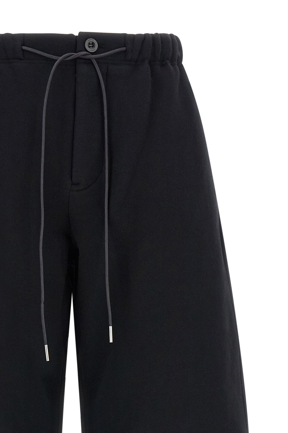 the sacai pants in pure cotton jersey redefine the codes of casual dress through