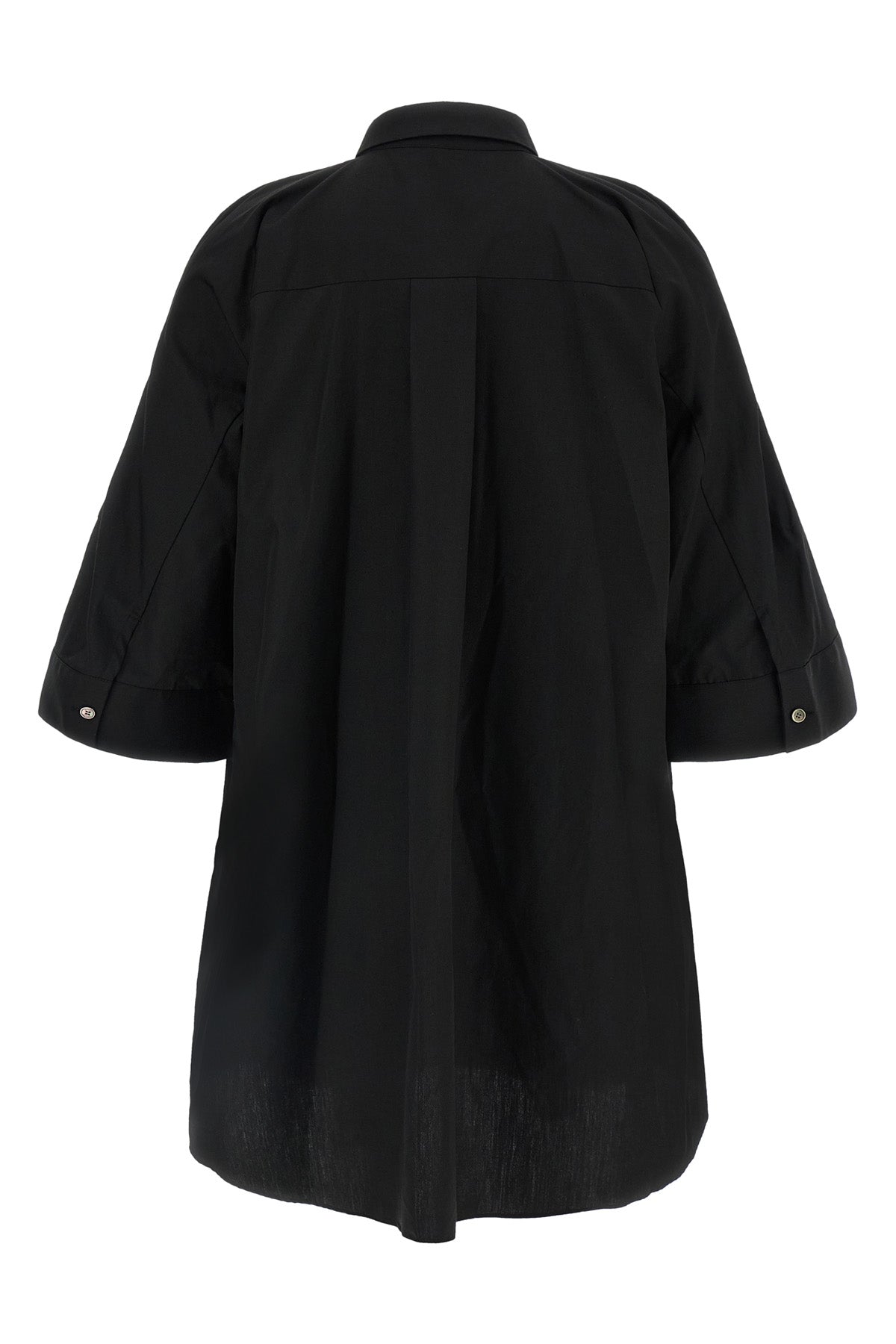 the sacai shirt dress redefines the codes of contemporary tailoring through unex