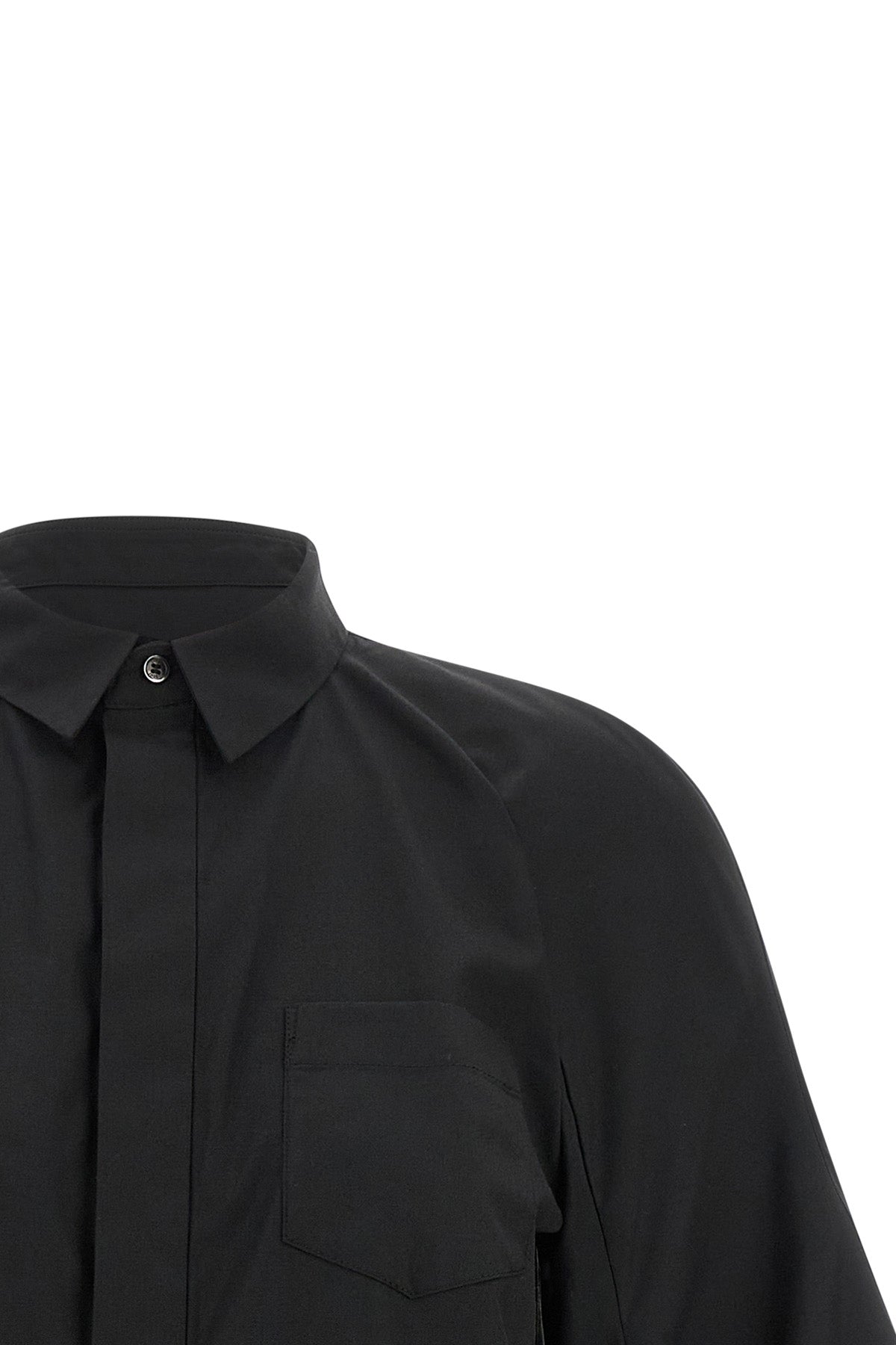 the sacai poplin shirt reinterprets the codes of classic tailoring through unexp