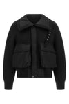 the sacai jacket redefines the codes of contemporary outerwear through a masterf