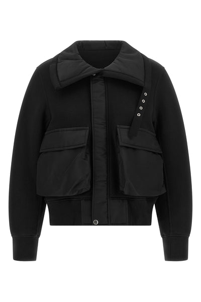 the sacai jacket redefines the codes of contemporary outerwear through a masterf
