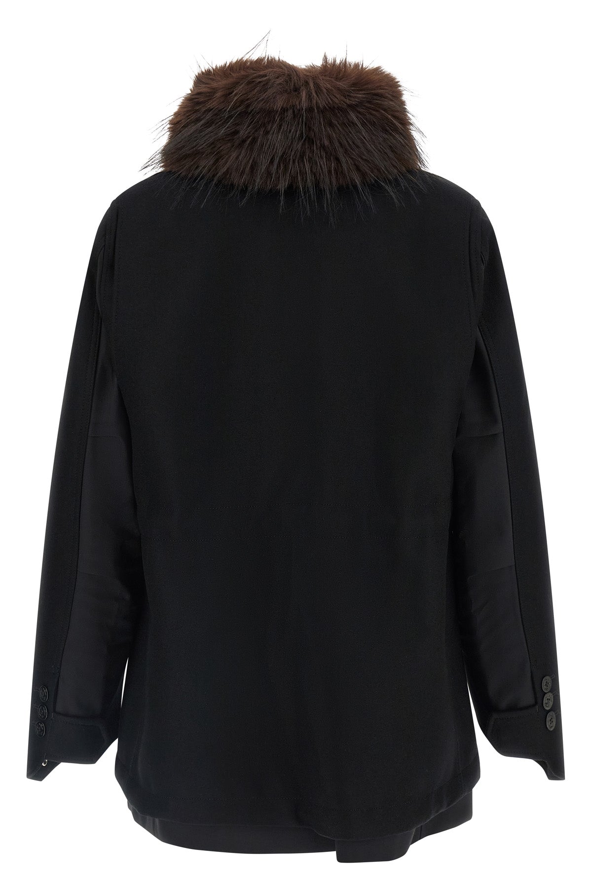 the sacai black jacket redefines the codes of outerwear through a complex hybrid