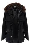 the sacai black jacket redefines the codes of outerwear through a complex hybrid
