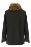 the sacai jacket redefines the codes of outerwear through a complex hybrid const