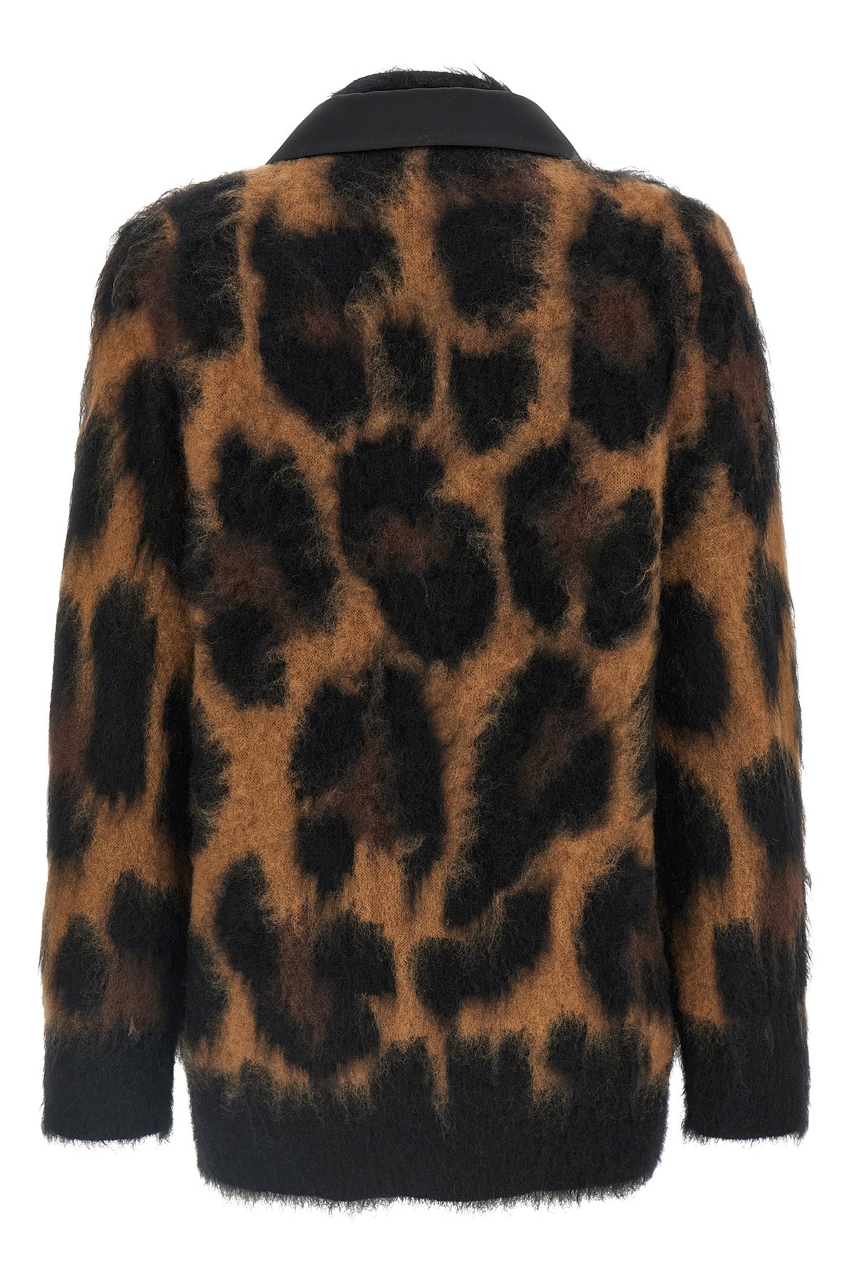 the sacai cardigan redefines knitwear codes through a complex hybrid constructio