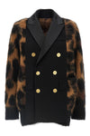 the sacai cardigan redefines knitwear codes through a complex hybrid constructio
