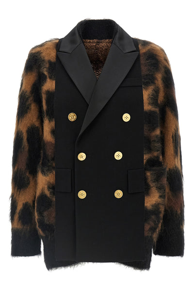 the sacai cardigan redefines knitwear codes through a complex hybrid constructio