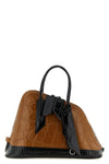 the attico x sant ambroeus la sant ambroeus handbag redefines the codes of lea