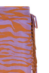il primo bagno sarong skirt in light all-over animal print cotton muslin