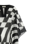 the caftan dries van noten presents a study on fluid volumes and sharp graphic c