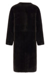 blanchas long fur redefines the codes of outerwear through a linear and rigorou
