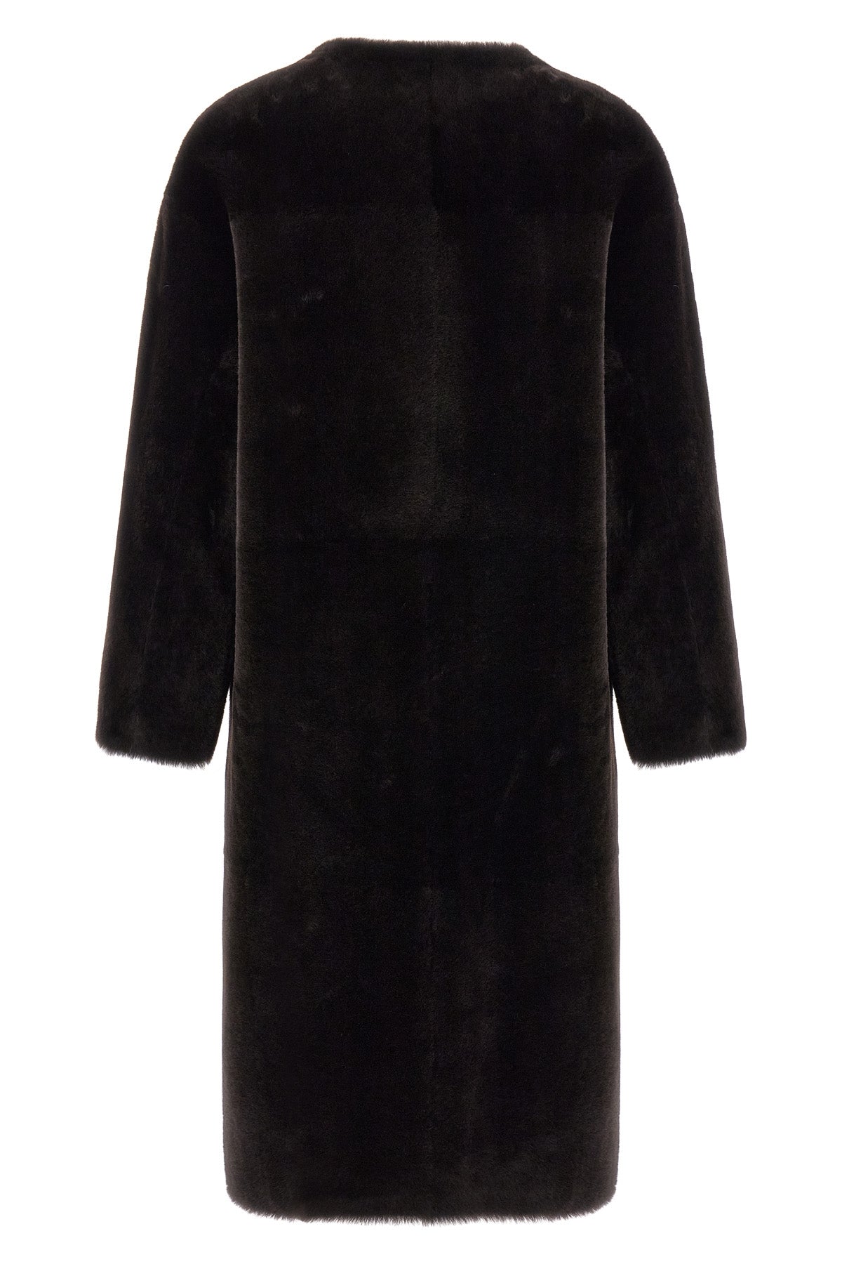 blanchas long fur redefines the codes of outerwear through a linear and rigorou