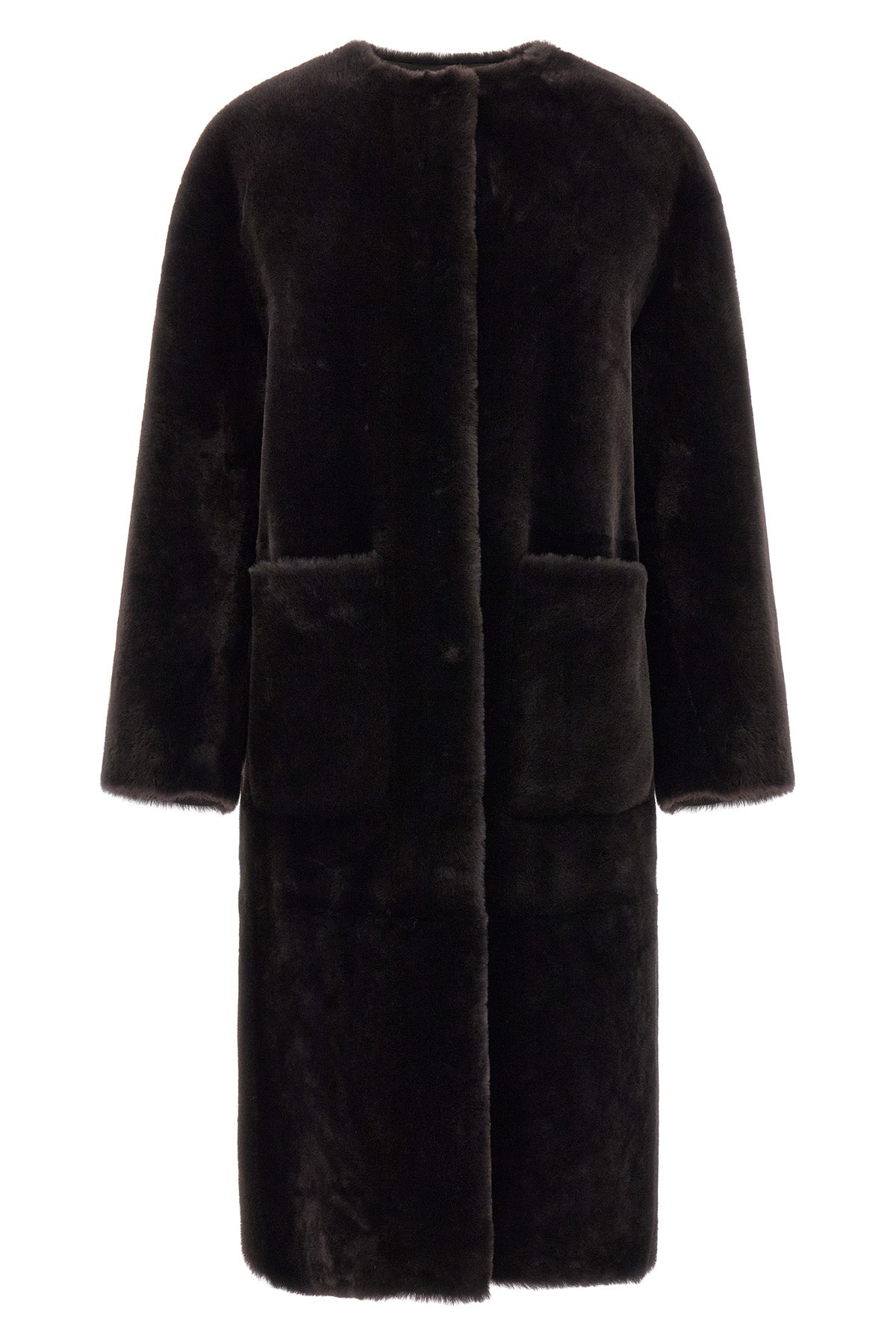 blanchas long fur redefines the codes of outerwear through a linear and rigorou
