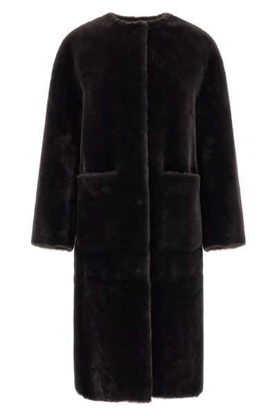 blanchas long fur redefines the codes of outerwear through a linear and rigorou