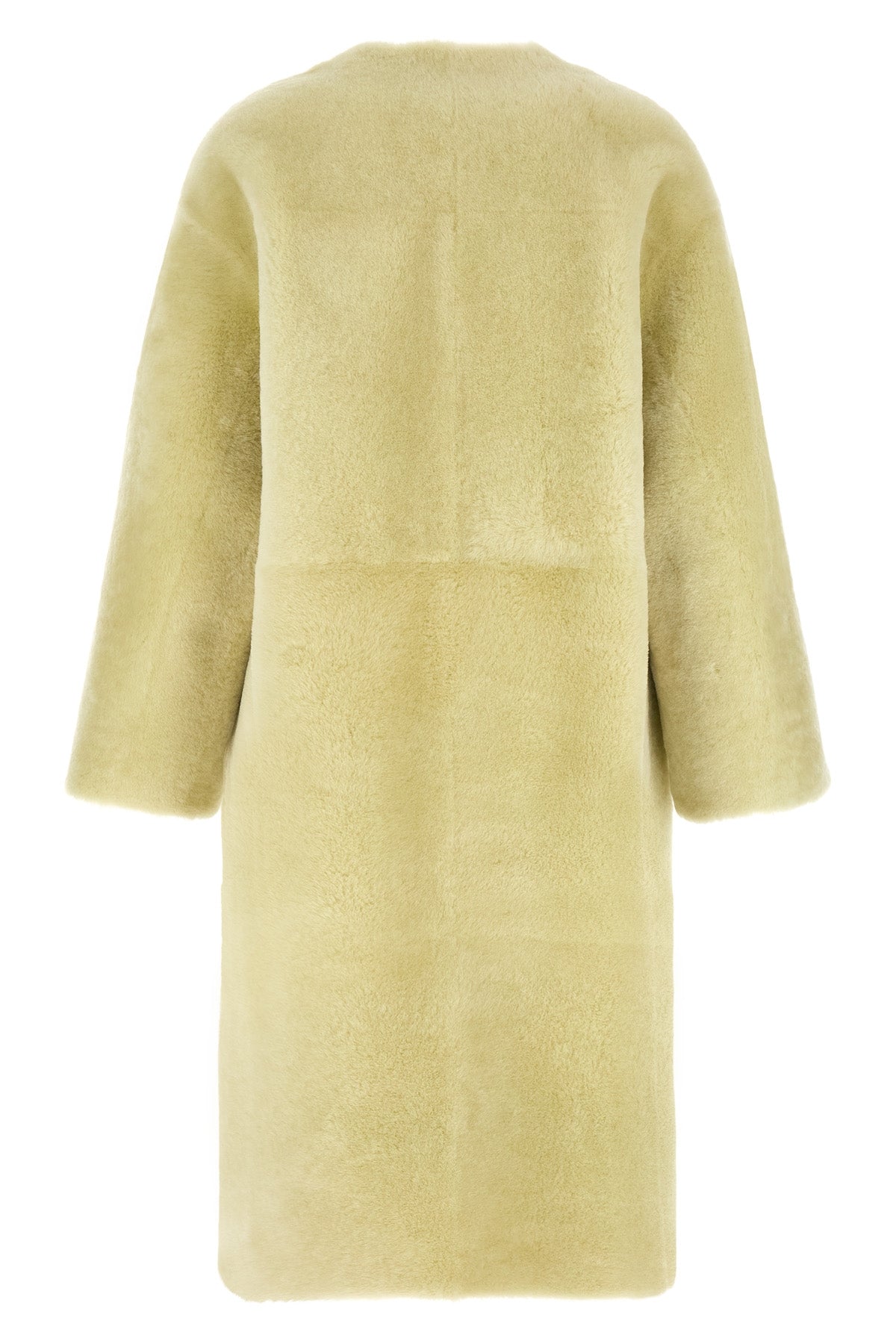 blanchas long fur defines the codes of luxury outerwear through a rigorous stra