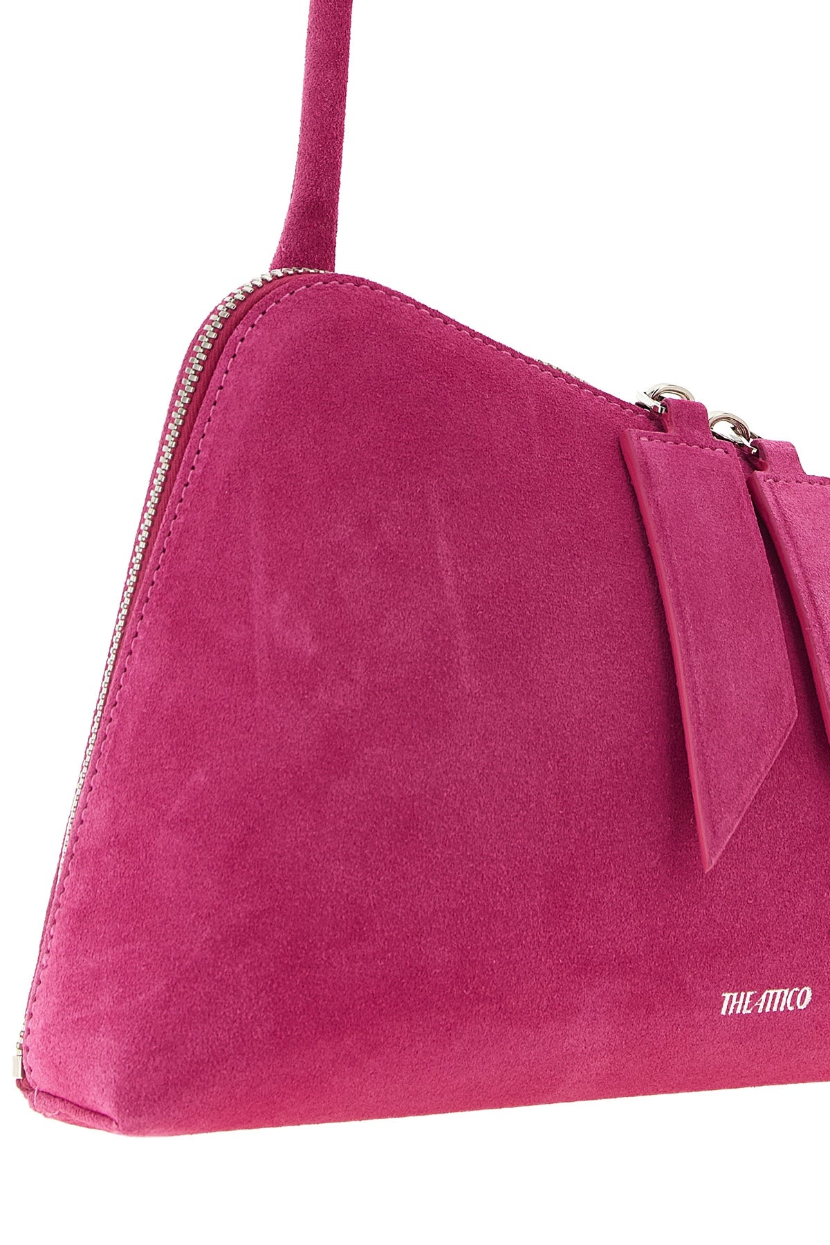 the attico sunrise shoulder bag is distinguished by an asymmetrical wedge-shap
