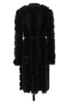 the attico long coat redefines the codes of knitwear through scenographic volume