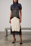 the the attico top in pure silk georgette stands out for a sartorial constructio