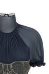 the the attico top in pure silk georgette stands out for a sartorial constructio