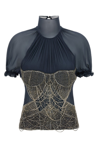the the attico top in pure silk georgette stands out for a sartorial constructio