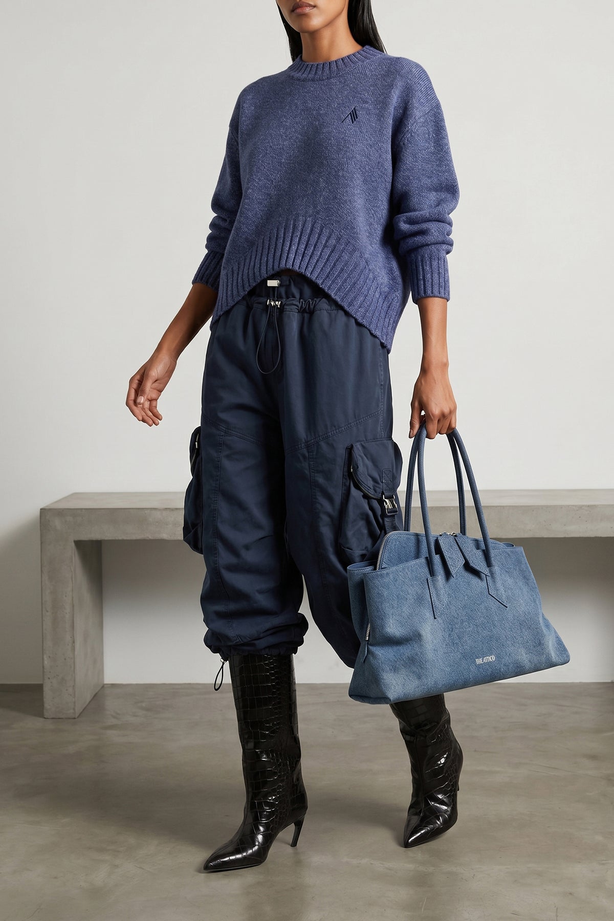 the the attico crew neck sweater redefines knitwear through a bold and deconstru