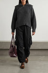 the the attico sweater redefines knitwear codes through a structured silhouette