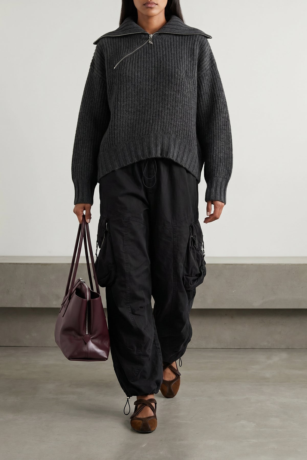 the the attico sweater redefines knitwear codes through a structured silhouette