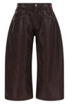 the attico trousers redefine the contemporary wardrobe through a wide and struct