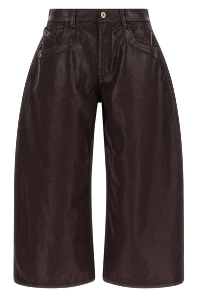 the attico trousers redefine the contemporary wardrobe through a wide and struct