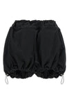 the attico shorts redefine the volumes of the contemporary wardrobe through a bo