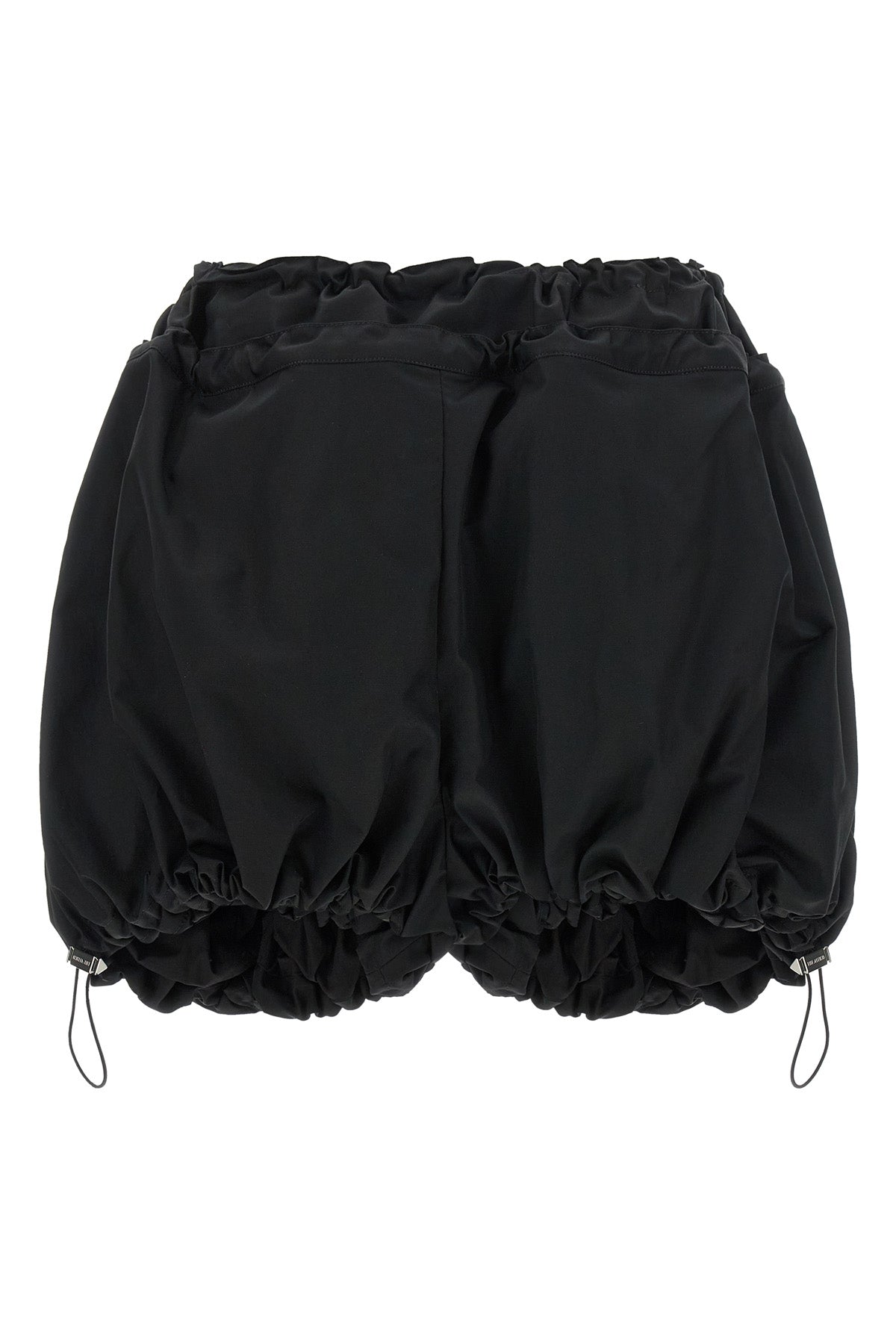 the attico shorts redefine the volumes of the contemporary wardrobe through a bo