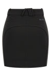 the attico mini skirt defines a sculptural and decisive silhouette through rigor