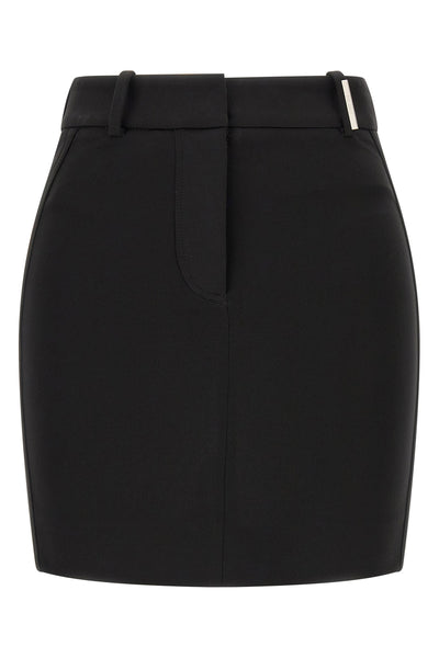 the attico mini skirt defines a sculptural and decisive silhouette through rigor