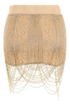 the mini skirt the attico in pure silk defines a bold silhouette through tailori