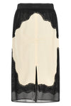 the midi skirt the attico defines a new concept of evening elegance through a pl