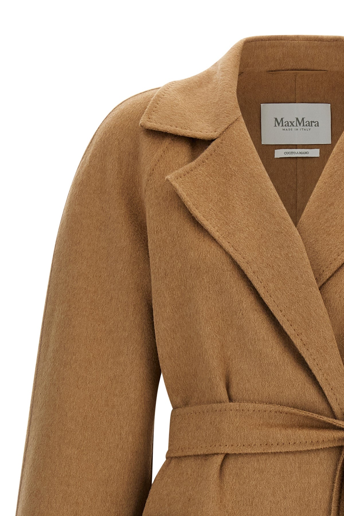 the max mara ready - icon coat embodies sartorial excellence through an envelo