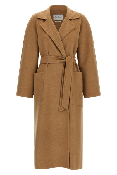 the max mara ready - icon coat embodies sartorial excellence through an envelo