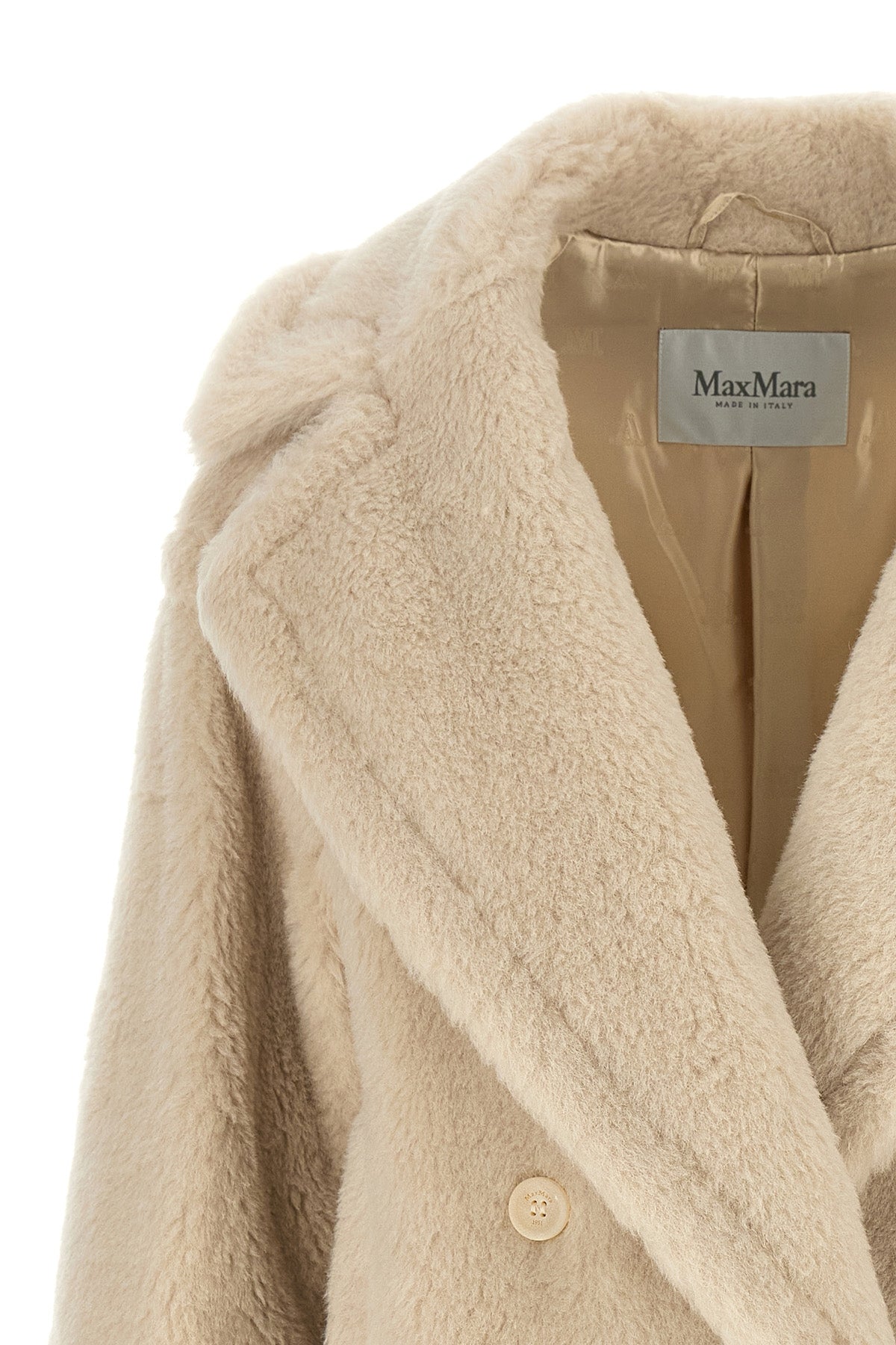 the max mara alcuno coat reinterprets the maisons iconic outerwear through a