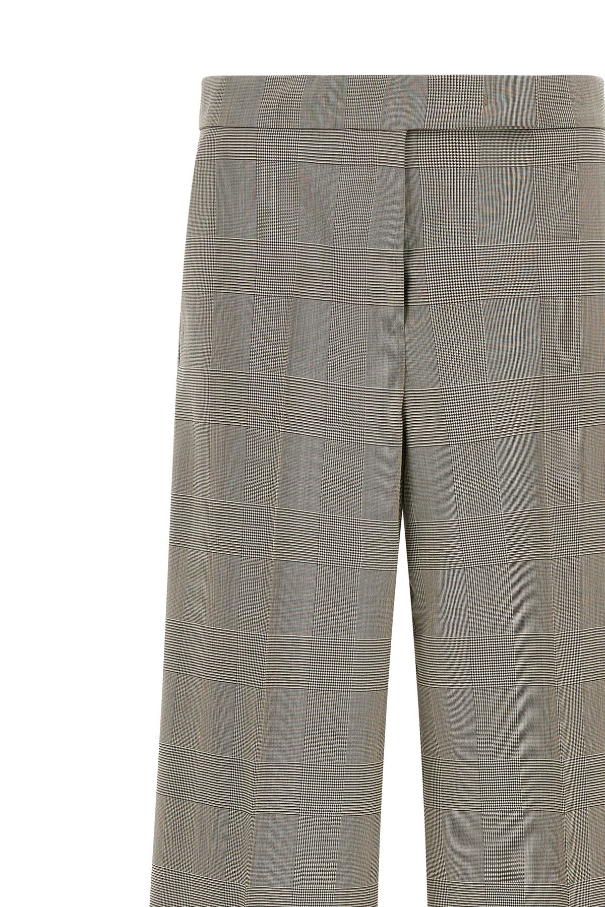 the max mara mxmnetto trousers redefine the codes of classic tailoring through