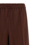 the max mara slalom trousers define a relaxed sartorial aesthetic through a wi