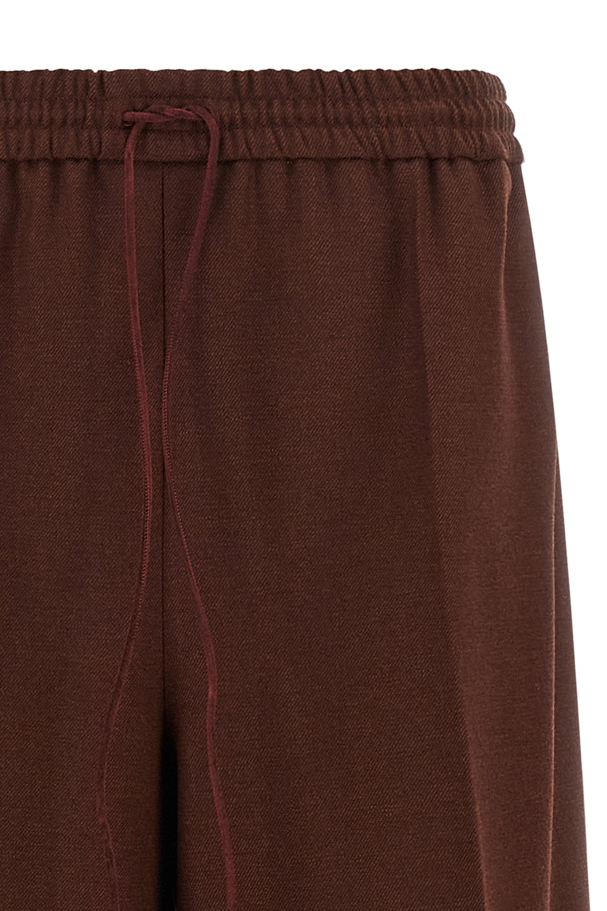 the max mara slalom trousers define a relaxed sartorial aesthetic through a wi