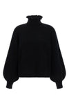 the max mara pontile knit redefines the codes of knitwear through sculptural v