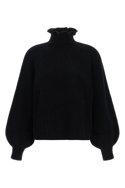 the max mara pontile knit redefines the codes of knitwear through sculptural v