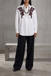 the statement necklace by dries van noten is distinguished by a sculptural con