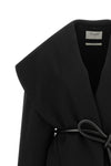 the sportmax spxuguale jacket redefines the volumes of outerwear through a rig