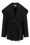 the sportmax spxuguale jacket redefines the volumes of outerwear through a rig