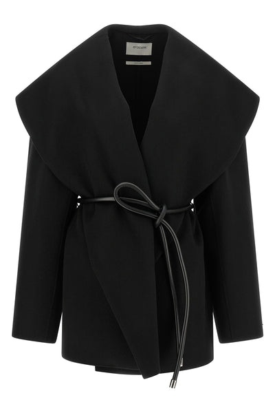 the sportmax spxuguale jacket redefines the volumes of outerwear through a rig