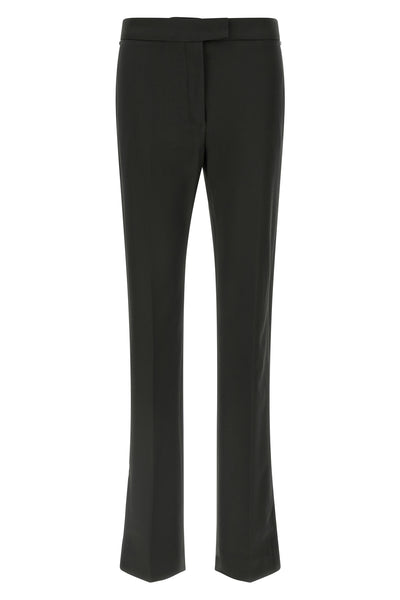 the sportmax guglia trousers redefine contemporary tailoring through an essent