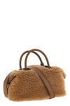 the max mara teddy holdals small handbag stands out for its iconic and volumin