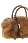 the max mara teddy holdals small handbag stands out for its iconic and volumin